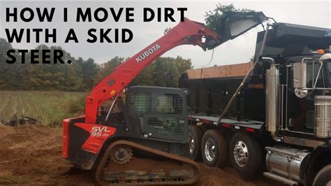 moving dirt with a skid steer|how to move dirt with skid steer.